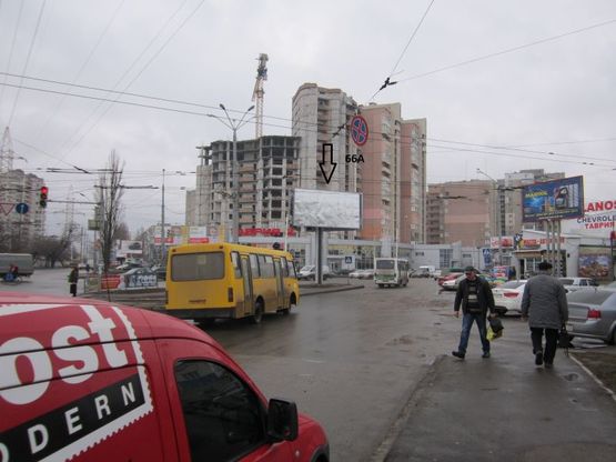 Фото рекламной плоскости по адресу просп. Маршала Жукова - ул. 25-й Чапаевской дивизии (на треугольнике)