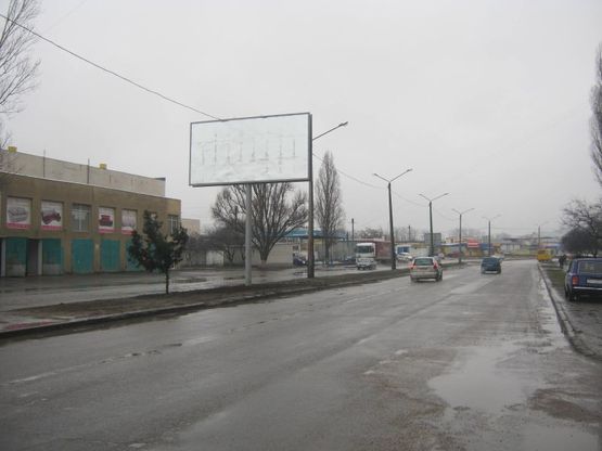 Фото рекламної площини за адресою Днепропетровская дорога - ул. Паустовского, 31 (на разделителе, от Таврии В)
