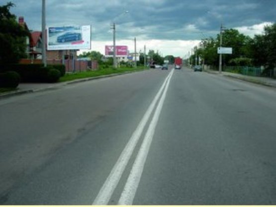 Фото рекламной плоскости по адресу Коновальця   ( гот. "Айвенго" )