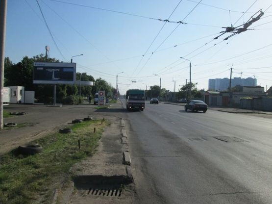 Фото рекламной плоскости по адресу ул. Космонавта  Комарова, 12/1