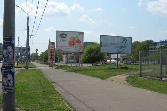 Фото рекламной плоскости по адресу пр-т М. Жукова (автосалон) - супермаркет "Сiльпо"