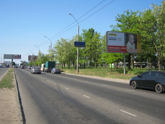 Фото рекламної площини за адресою просп. Маршала Жукова, 91-А (возле автостоянки № 3)