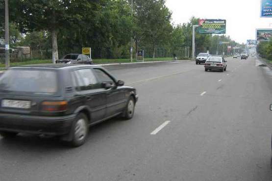 Фото рекламної площини за адресою ул. Краснова (АЗС) - (напротив автосалона Dawoo) (Гусак)