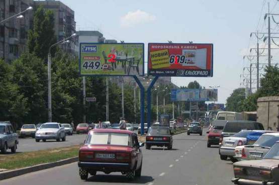 Фото рекламной плоскости по адресу пр-т Ак.Глушко -"Моримото" Чебурашка (на 7 ст. Люстдорфской дор. (правый))