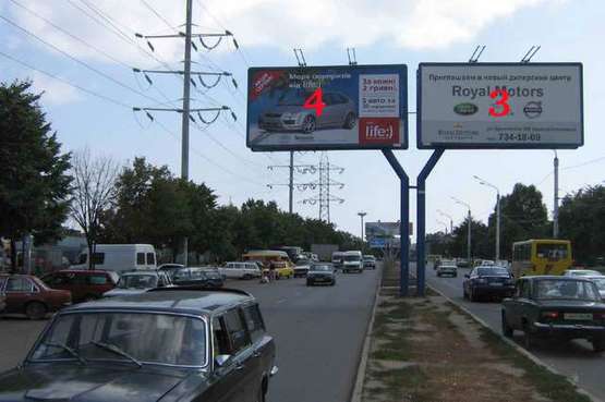 Фото рекламної площини за адресою пр-т Ак.Глушко -"Моримото" Чебурашка (на пл. Деревянко (левый))