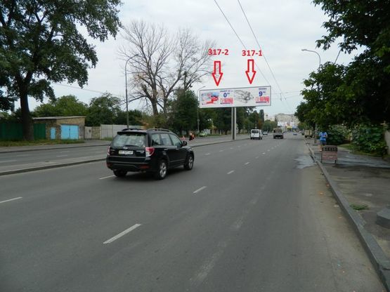 Фото рекламной плоскости по адресу ул. Щорса, 109 (на разделителе к ТЦ Аэропортовский) (правая)