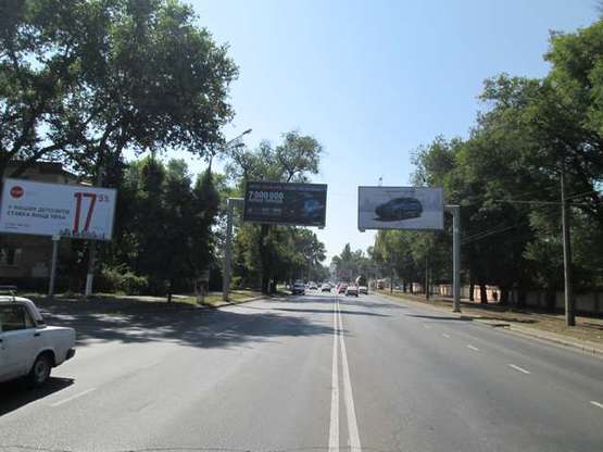 Фото рекламної площини за адресою Люстдорфская дорога, 11 / пер. Ипподромный (навпроти) (з міста права)