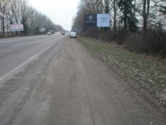 Фото рекламной плоскости по адресу Тисминецька     перед знаком Івано-Франківськ (правий)