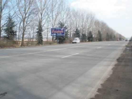 Фото рекламной плоскости по адресу Тисминецька     перед знаком Івано-Франківськ (правий)