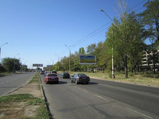 Фото рекламної площини за адресою просп. Маршала Жукова, 91-А (возле автостоянки № 3)