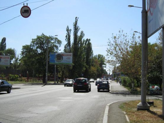 Фото рекламной плоскости по адресу ул. Гастелло - ул. Щорса, 125/4 (напротив)