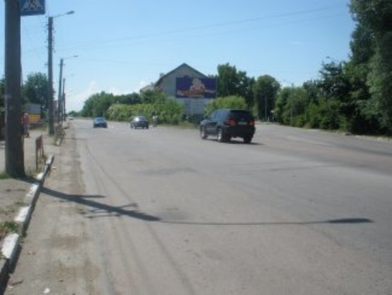 Фото рекламної площини за адресою Коновальця ( перед мостом)     автосалони