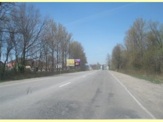 Фото рекламной плоскости по адресу Калуське шосе (знак Угринів)             перед WOG      виїзд