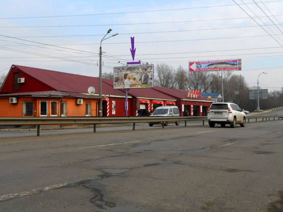 Фото рекламной плоскости по адресу ул.Луговая напротив „Каравана” направление Оболони