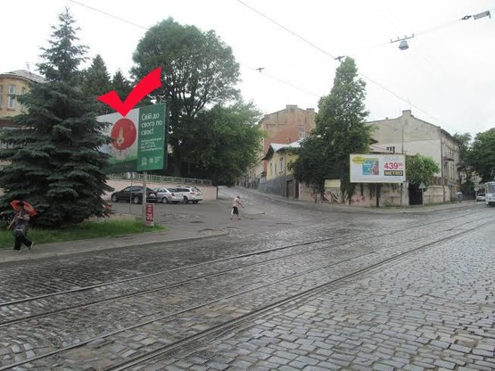 Фото рекламной плоскости по адресу вул.Шевченка, 31-вул.Бортнянського