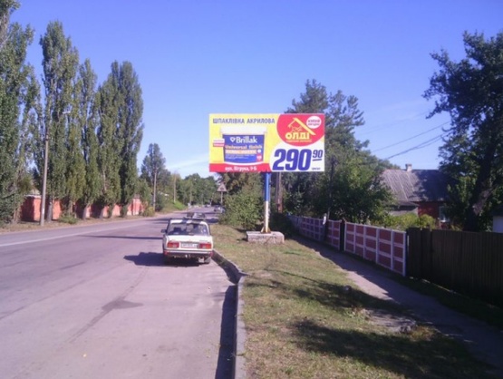 Фото рекламной плоскости по адресу Коростень в.Жовтнева 30, біля заправки ВОГ, ст А