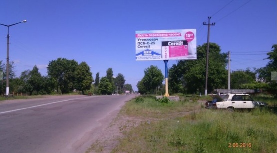 Фото рекламной плоскости по адресу Коростень в.Грушевського 221,біля Собору,заводу "Янтар", ст А.