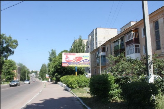 Фото рекламной плоскости по адресу Коростень в.Сосновського 23,центр міста, напроти супермаркету "АТБ" ст А