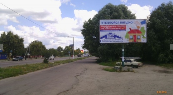 Фото рекламной плоскости по адресу Коростишів в. Більшовицька 129,центральна вулиця, напрямок з Житомира на Київ, ст А