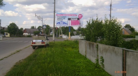 Фото рекламной плоскости по адресу Романів в.Фрунзе 10, центр міста, ст А