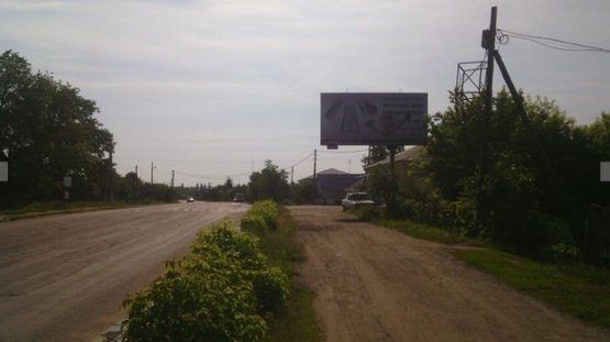 Фото рекламної площини за адресою Хорошів (Володарськ-Волинський в. Чапаєва 6, виїзд з міста в сторону Житомира,Пулин, ст А