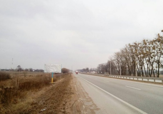 Фото рекламной плоскости по адресу Траса Київ-Житомир. Перед заправкою "СОКАР", напрямок з Житомира на Київ, ст.Б