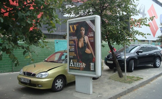 Фото рекламной плоскости по адресу Вул. Жилянська / Комінтерна, 30 ("ТАС - Банк")