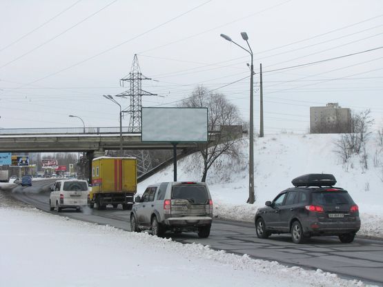 Фото рекламной плоскости по адресу Богатирська вул. перед мостом