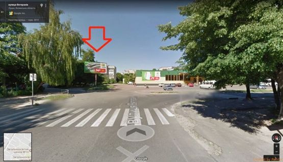 Фото рекламной плоскости по адресу вул.Ветеранів,6 (супермаркет "Просто Маркет")