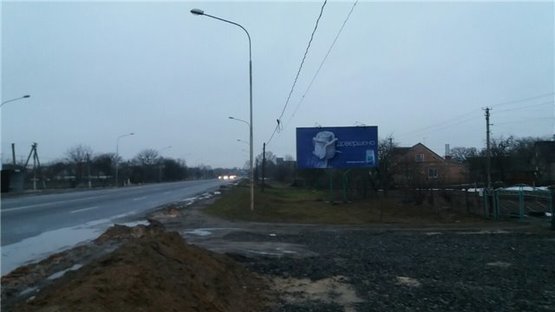 Фото рекламной плоскости по адресу с.Підгайці (при вїзді в місто Луцьк,  траса Дубно-Луцьк, перед Дубнівським кільцем)  0,5 км від Луцька