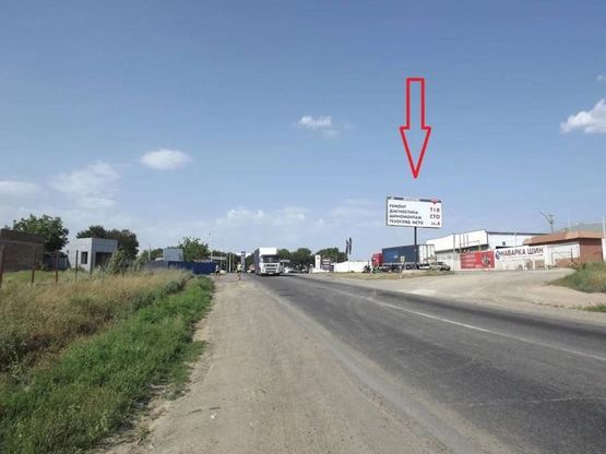 Фото рекламної площини за адресою Объездная дорога , 147 - авторынок "Куяльник"