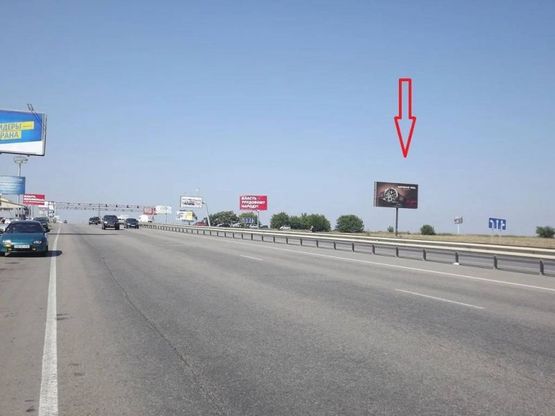 Фото рекламной плоскости по адресу Овидиопольская дорога (промрынок) - напротив Эпицентра
