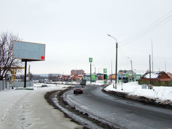Фото рекламної площини за адресою вул.Купріна, біля АЗС "ОККО". неподалік: продовольчий оптовий ринок "ДУБОВО", АЗС "УкрНафта", АЗК "ОККО", АЗС "Шелл", ресторани, спорткомплекси (в центр)