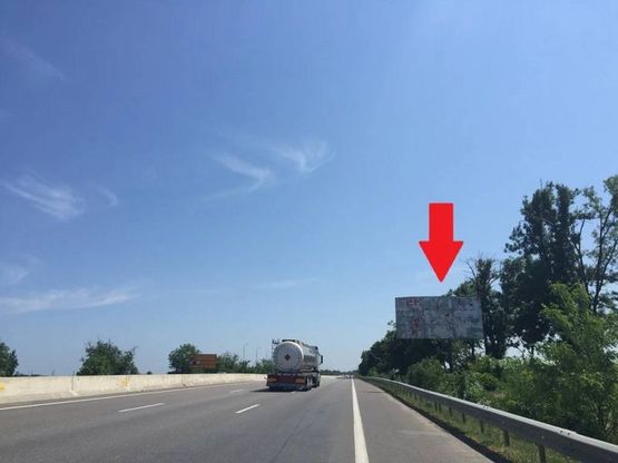 Фото рекламной плоскости по адресу Киевское шоссе  - поселок Нерубайское - между АЗС Shell и рестораном Фрумушика