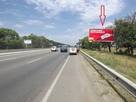 Фото рекламної площини за адресою Киевское шоссе, 10б - напротив офиса ТМ Копейка  - АЗС ВОГ (за часовней Николая Чудотворца)