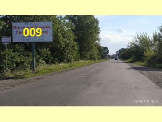 Фото рекламної площини за адресою Снятинський район, с.Тулуків, вул.Головна, біля ТЦ "Явір-Ц" (траса на Коломию) траса Ів-Франк-Чернівці