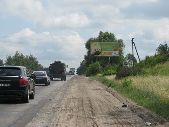 Фото рекламної площини за адресою А/д Киев-Одесса 12, км 41+250 м, справа / из Киева, рест.-гост. комплекс "Двір куркуля", база "Гасай!" (квадроциклы), 27 км до Одесской пл., отл. видимость (на подъеме дороги)