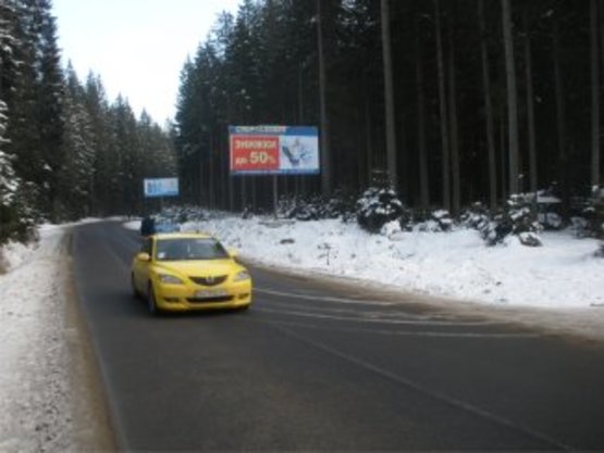 Фото рекламной плоскости по адресу перед мостом (лівий)