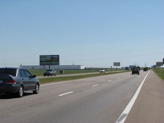 Фото рекламной плоскости по адресу Бровары - окружная, а/д Киев-Чернигов 02, км 24+000 м, слева / за рестораном "Петровский бровар", разворот на с.Княжичи (Княжий двир), направление - из Киева
