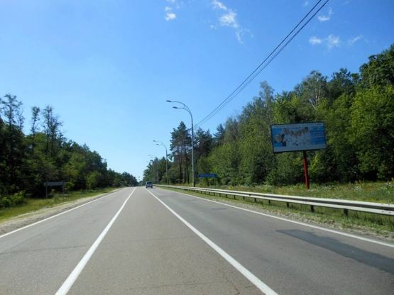 Фото рекламної площини за адресою Траса "Київ-Іванків-Овруч", Р-02 км 18+ 700 ліво, м. Київ, пос. Микільський, 500 м. вул. Дніпроводна, в'їзд в  Київ