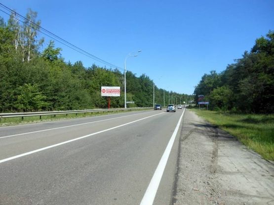 Фото рекламной плоскости по адресу Траса "Київ-Іванків-Овруч", Р-02 км 18+ 700 ліво, м. Київ, пос. Микільський, 600 м. до завода SANDORA, 1 км до КПП, на c. Нові Петрівці
