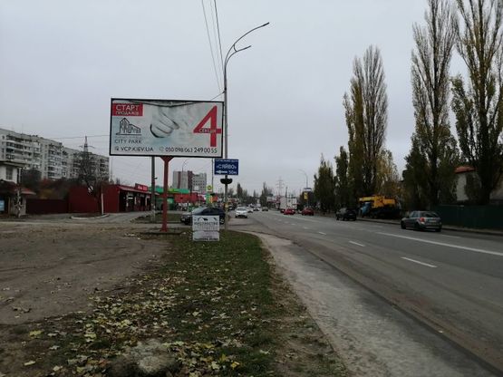 Фото рекламної площини за адресою м. Вишгород, вул. Набережна, перехрестя з вул. Шкыльна, навпроти магазину Сільпо, за 75м до АЗС WOG