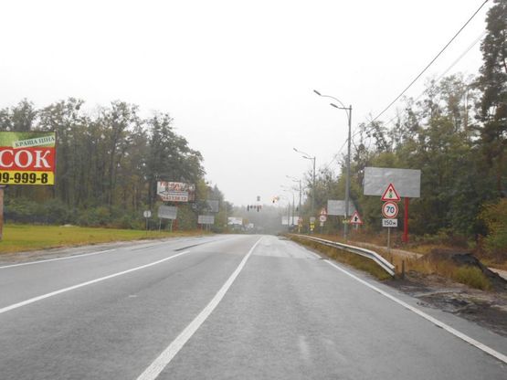 Фото рекламної площини за адресою Траса "Київ-Іванків-Овруч", Р-02 км 19+ 350 лево,на світлофорі, перед поворотом на SANDORA, HENKEL-Україна, виїзд з Вишгорода до пл. Шевченко