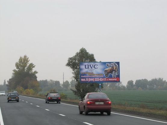 Фото рекламної площини за адресою А/д Киев-Черкассы 08, км 21+050 м, слева / в Киев; АФ "Наша Ряба"; за выездом из с.Мирное / а-д Н-08 Киев-Днепропетровск-Запорожье