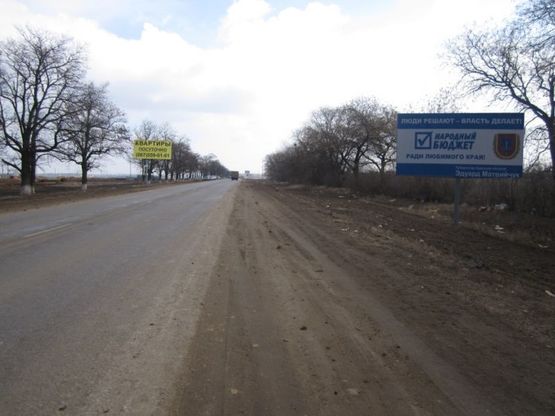 Фото рекламной плоскости по адресу Одесса-Кучурганы, 13+540 Б (справа)