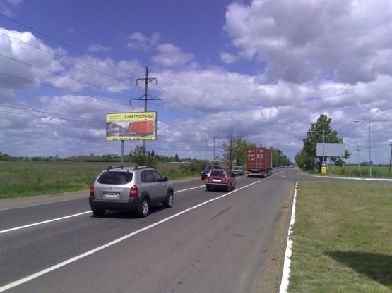 Фото рекламної площини за адресою Объездная дорога, перед Клеверным мостом, 18+200 Б (справа)
