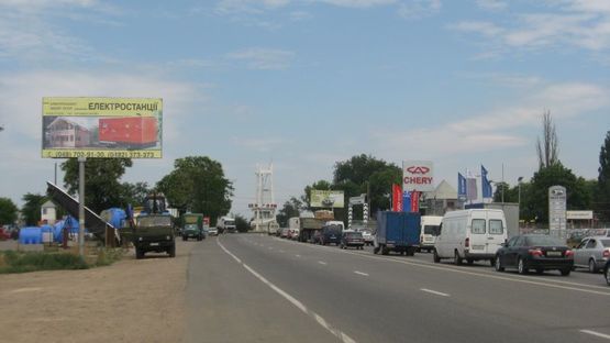 Фото рекламної площини за адресою Объездная дорога, 2 столба, 23+430 Б (справа)