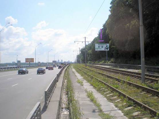 Фото рекламной плоскости по адресу Набережное шоссе со стороны Хрещатого парка направление на мост Метро