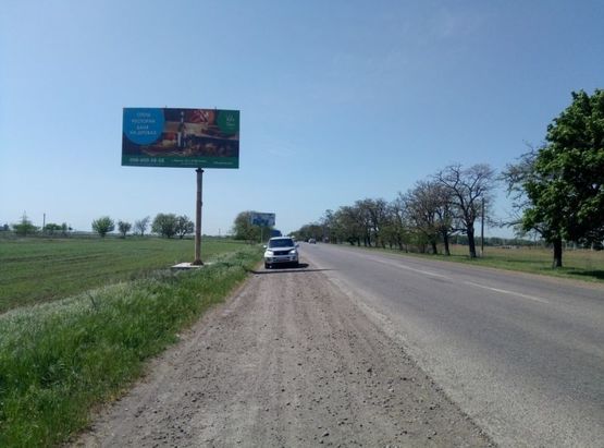 Фото рекламной плоскости по адресу Одесса-Кучурганы 12+500 Б (из Одессы)