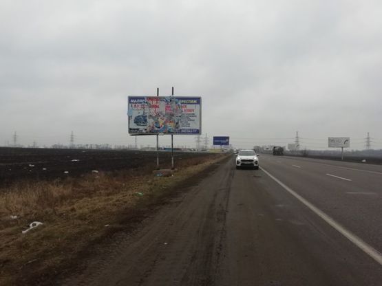 Фото рекламної площини за адресою Объездная дорога 21+300 Б (в стор клеверного моста)